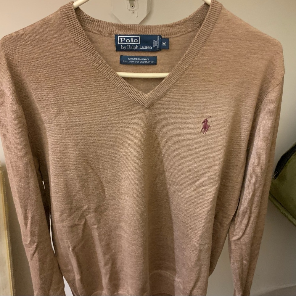 100% Merino Wool Polo Ralph Lauren
Size medium fits Small 
Never worn!!